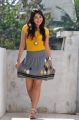 Catherine Tresa Hot Pictures in Yellow Top & Mini Skirt