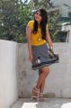 Catherine Tresa Hot Pictures in Yellow Top & Mini Skirt