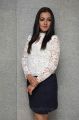 Catherine Tresa in White Top & Business Skirt