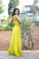 Actress Catherine Tresa Photoshoot HD Stills in Yellow Long Dress