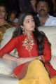 Charmi in Red Dress at Srimannarayana Triple Platinum Disc Function
