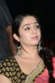 Actress Charmi Photos @ Potugadu Audio Release