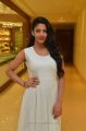 Actress Daksha Nagarkar Stills in White Gown