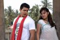 Raghu Mukherjee, Priyanka Kothari in Dandupalya Telugu Movie Stills