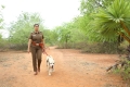 Varalaxmi Sarathkumar as a Police Officer Kunthavai in Danny Movie Images HD