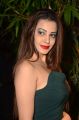 Actress Diksha Panth Hot Images in Green Mini Frock