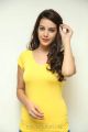 Actress Deeksha Panth Pics in Light Yellow Top