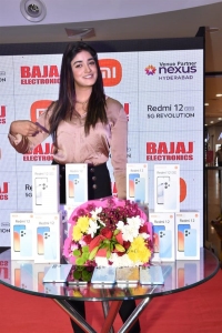 Dimple Hayathi launches Redmi 12 5G at Bajaj Electronics, Nexus Hyderabad Mall