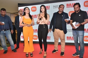 Actress Dimple Hayathi launches Redmi 12 5G at Bajaj Electronics Photos