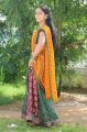 Divya Singh Cute Photos in Yellow Georgette Saree