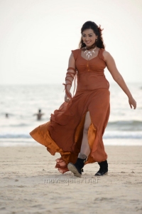 Actress Ester Noronha Hot Pictures in Moderate Orange Color Dress