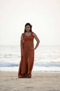 Actress Esthar Hot Pictures in Moderate Orange Color Dress