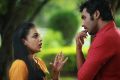 Nithya Menon, Krish J. Sathaar in Ghatana Telugu Movie Stills