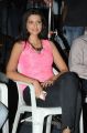 Actress Hamsa Nandini posing in Pink T-Shirt and Jeans