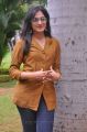 Haripriya New Photos in Orange Top & Blue Jeans
