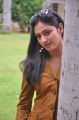 Actress Haripriya in Orange Top & Blue Jeans Photos