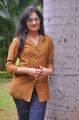 Telugu Actress Haripriya Photos in Orange Top & Blue Jeans