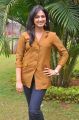Telugu Actress Haripriya Photos in Orange Top & Blue Jeans