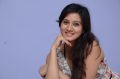 Actress Harshika Poonacha in Mini Gown Pictures