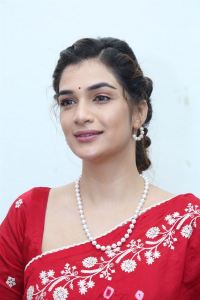 Purushothamudu Movie Heroine Hasini Sudhir in Red Saree Photos