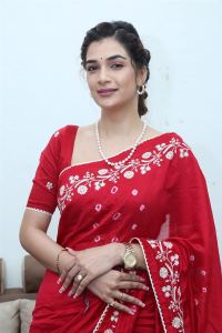 Purushothamudu Movie Heroine Hasini Sudhir in Red Saree Photos