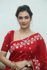 Purushothamudu Movie Heroine Hasini Sudhir in Red Saree Photos