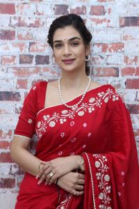 Purushothamudu Movie Actress Hasini Sudhir in Red Saree Photos