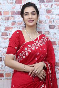 Purushothamudu Movie Heroine Hasini Sudhir in Red Saree Photos