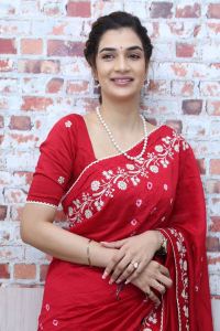 Purushothamudu Movie Heroine Hasini Sudhir in Red Saree Photos