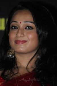 Actress Indu Thampi Photos in Saree @ Nizhal Press Meet