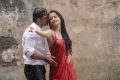 Arjun Sarja, Surveen Chawla in Itlu Prematho Movie Hot Stills
