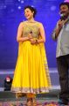 Kajal in Beautiful Yellow Designer Dress at Naayak Audio Launch