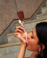 Actress Kajal Agarwal Eating Ice Cream Photos