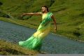 Kajal Hot Green Yellow Saree Stills in Thuppaki Movie