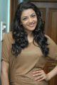 Actress Kajal Agarwal Photoshoot Pics in Light Brown T Shirt & Blue Jeans