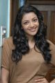 Actress Kajal Agarwal in Light Brown T Shirt Photoshoot Pics