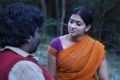 Arjuna, Varsha Ashwathi in Kangaroo Tamil Movie Stills