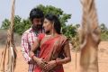 Udhaya Kumar, Rhythamika in Karisalpattiyum Gandhinagarum Movie Stills