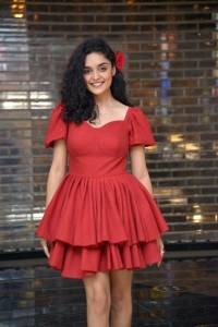 Actress Kashish Khan Photos in Red Short Skirt