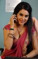 Kavya Singh Hot Stills in Moderate Red Saree