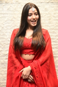 Actress Ketika Sharma in Red Lehenga Choli Photos