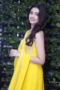 Actress Krithi Shetty Cute Photos in Yellow Churidar