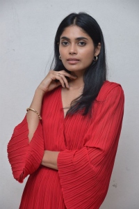 Actress Kritika Shetty in Red Dress Stills