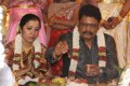 KS Ravikumar with his wife Karpagam Stills