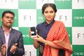 First sale of OPPO F1 to Famous Tamil Film Actress Lakshmi Menon present at the showroom