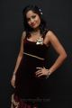 Madhavi Latha Latest Hot Stills in Dark Red Violet Dress