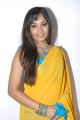 Madhavi Latha in Sleeveless Yellow Saree Stills