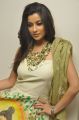 Actress Madhurima New Photos in Sleeveless White Long Dress