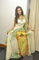 Madhurima Banerjee posing in Sleeveless White Buddha Printed Long Dress
