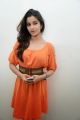 Beautiful Madhurima posing in Orange Dress